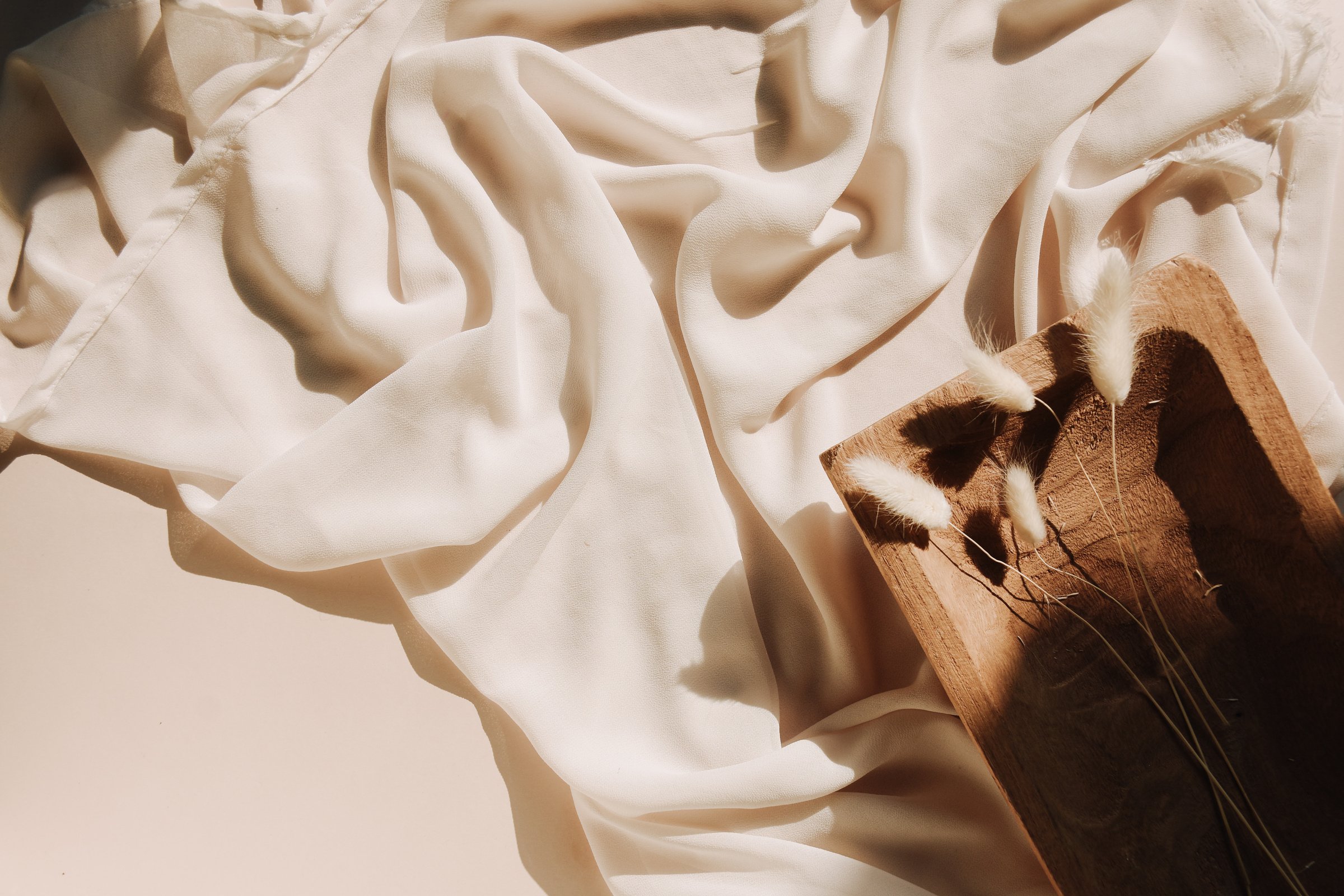 White Cloth with Dried Flower on Wooden Bowl